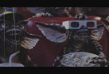 Gremlins at the local movie theatre watching Snow White and the Seven Dwarfs