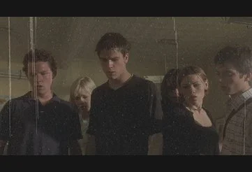 The core group of students in confrontation with their science teacher in The Faculty