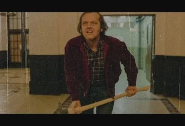 Jack with an axe silently marching through the hotel