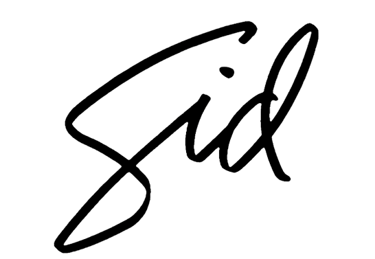 Black signature that reads 'Sid' on a white background.