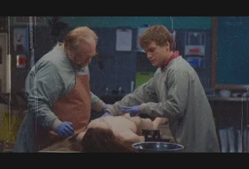 Tommy and Austin Tilden performing a late-night post mortem in The Autopsy of Jane Doe
