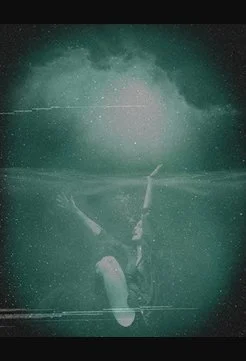 woman dragged under water