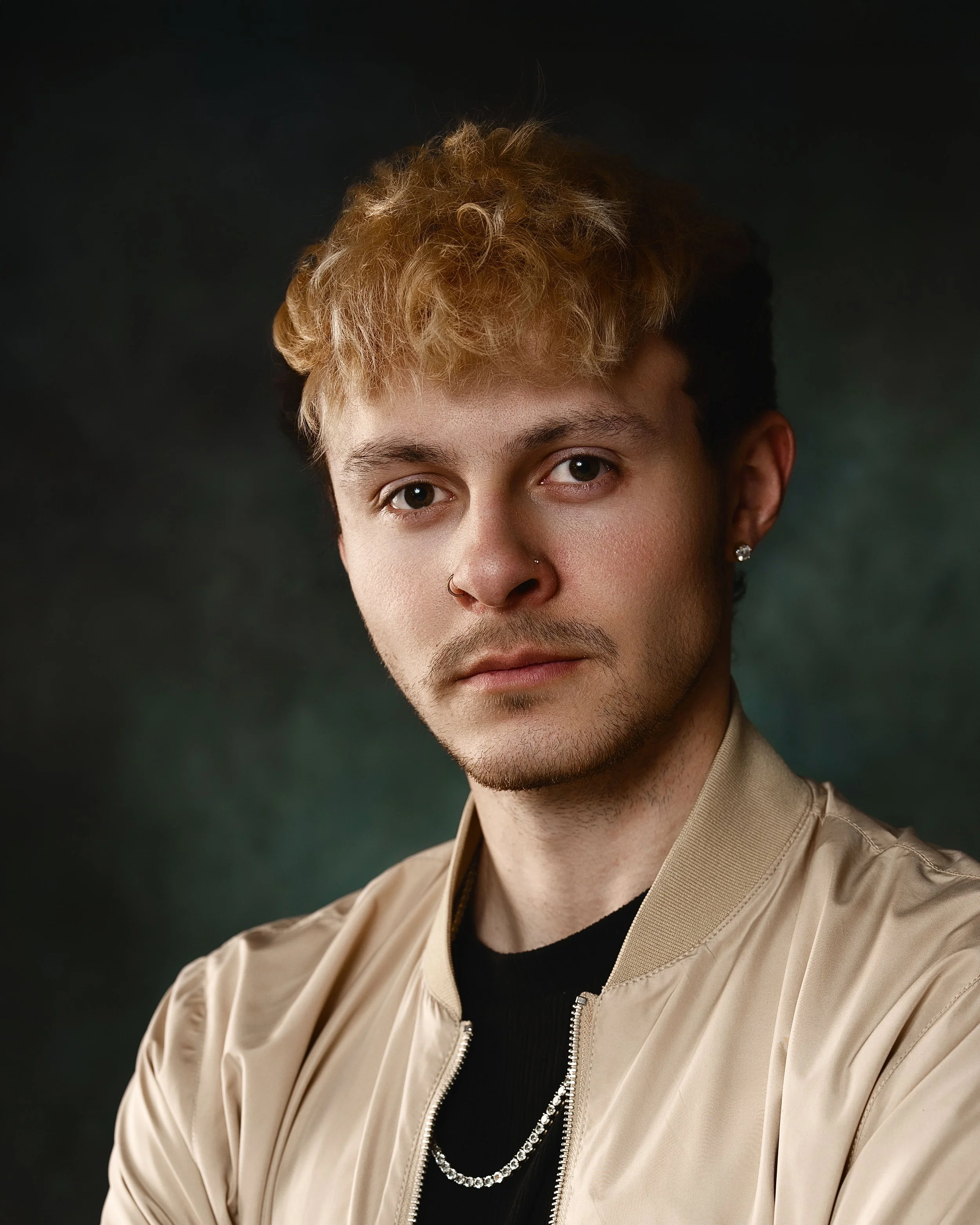 Actor headshot bleach blond man