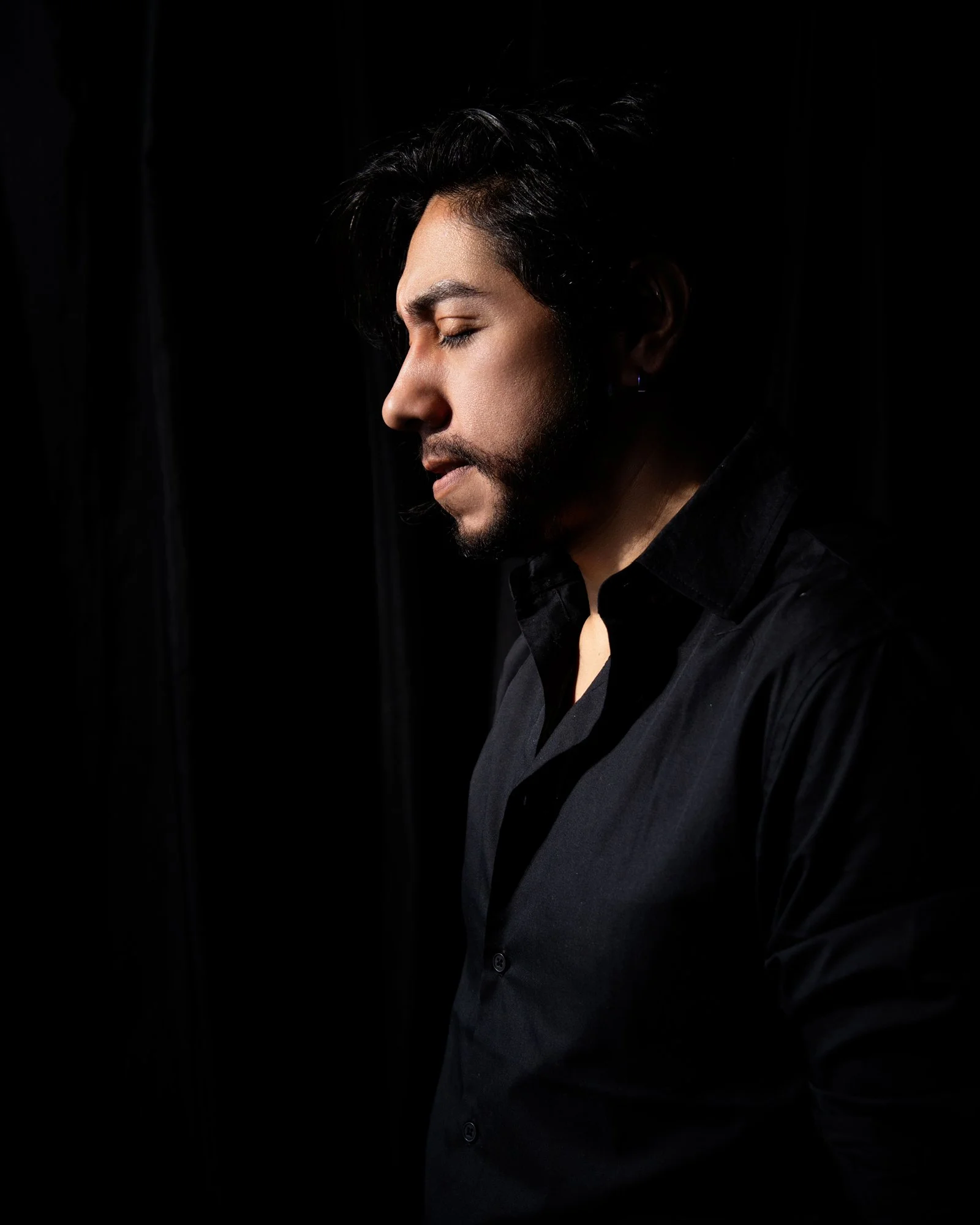 moody portrait of man in profile
