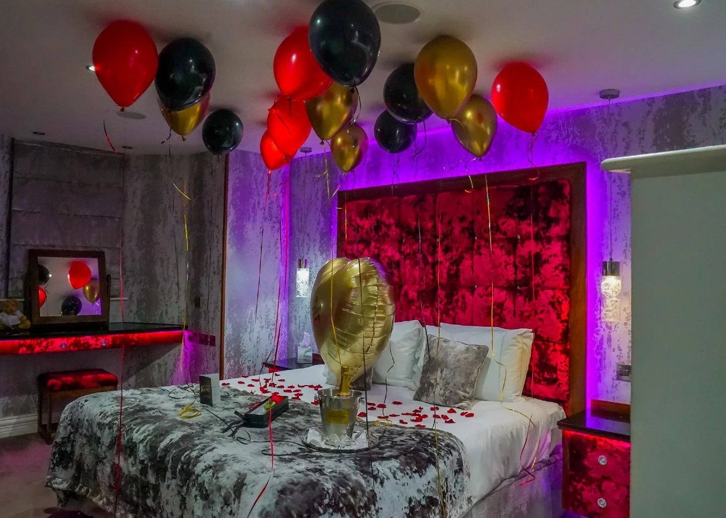 Your anniversary deserves more than a card from the corner shop.
CRANLEIGH ANNIVERSARY PACKAGE
Walk into:
🎈 Heart balloon waiting
🌹 Red roses scattered
🍾 Laurent-Perrier Champagne chilled
✨ Rose petals everywhere
🎈 Balloons floating above

The &q