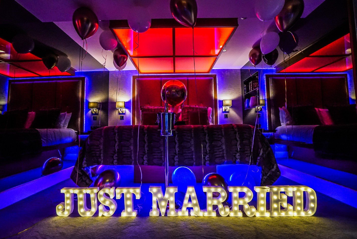 Newlywed luxury, sorted 💕

Honeymooning or celebrating after the big day? This package does the romantic heavy lifting for you.
You get:

Giant light-up &quot;JUST MARRIED&quot; letters (16&quot;)
Rose petals everywhere
One perfect red rose
Hot air 