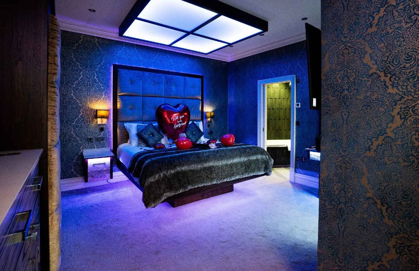 Some questions deserve more than a text 💕

Our "Will You Be My Girlfriend" package turns your Cranleigh room into the moment she'll remember:
🎈 Red heart-shaped balloon asking the question
🌹 Rose petals scattered just right
💐 Single box