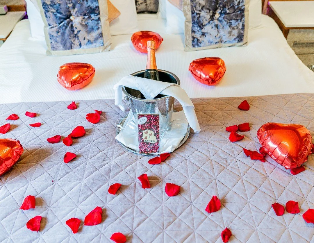 GIVE THE GIFT OF "US TIME" ☁️

No alarms. No distractions. Just the two of you and our "I Love You" package.

Leave the world behind and retreat to a designer space filled with Balfour Ros&eacute;, bespoke heart balloons, and the 