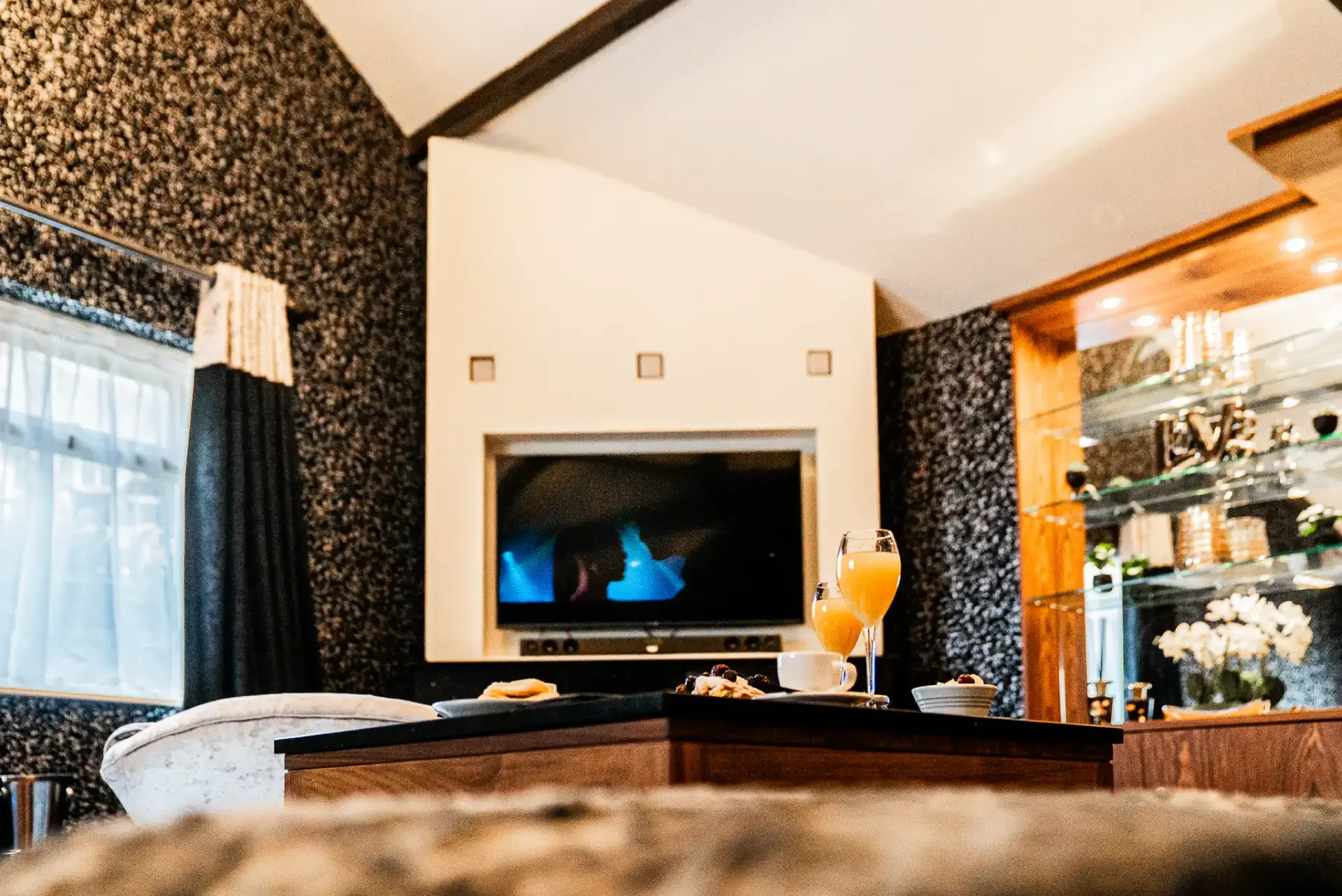 hotel-room-with-breakfast-and-tv.webp