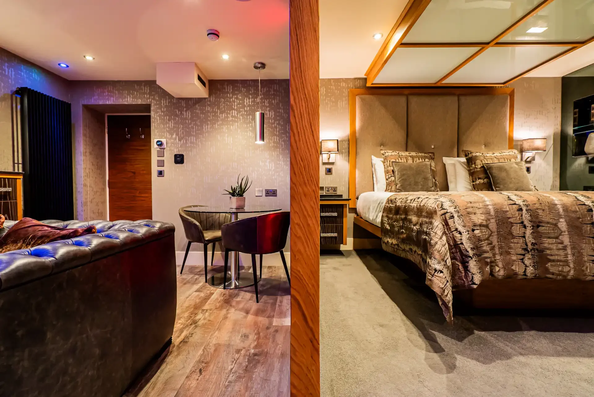 indulgence suite bowness hotel bedroom lounge