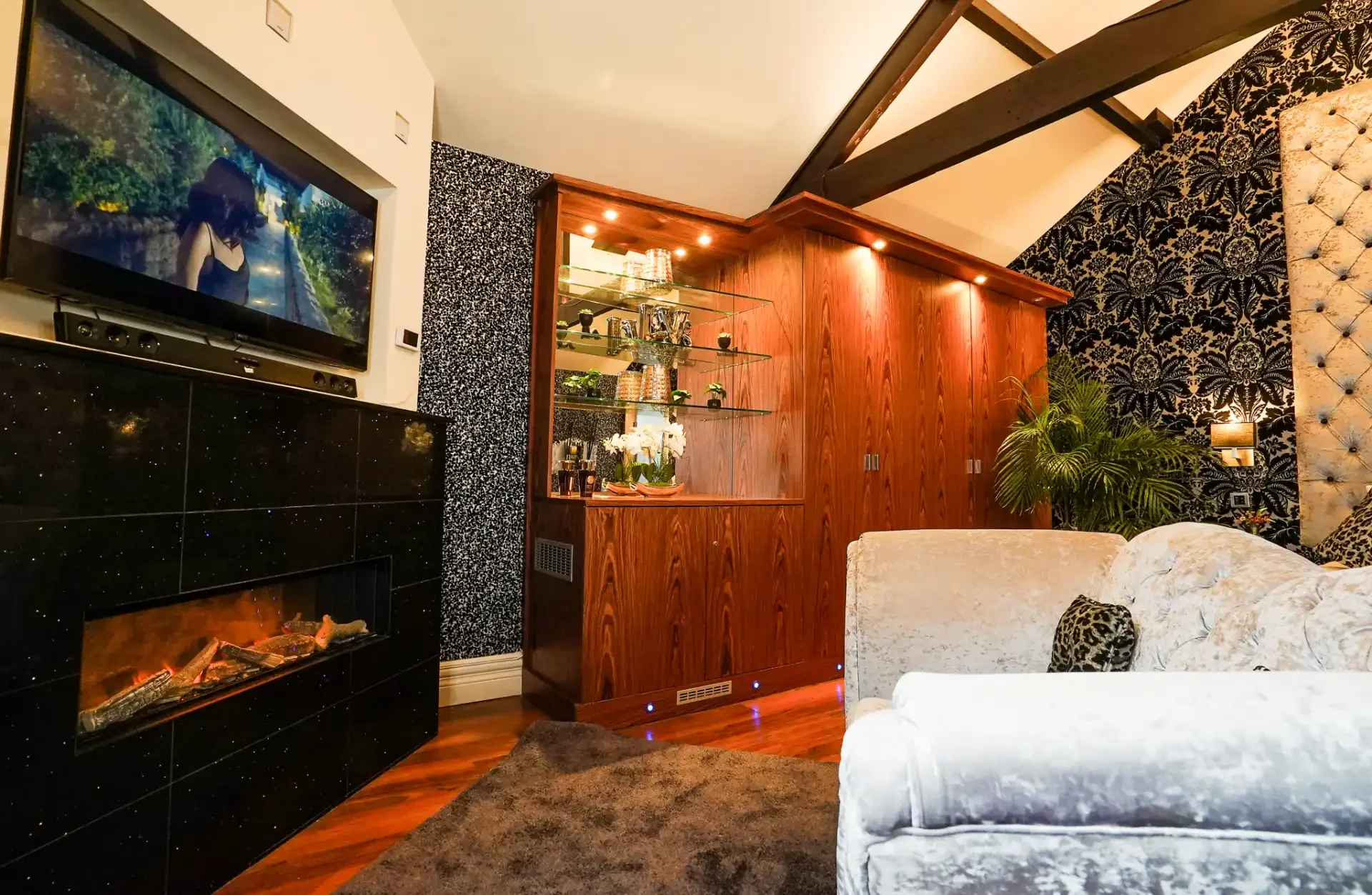 luxury-living-room-with-fireplace-and-tv.webp