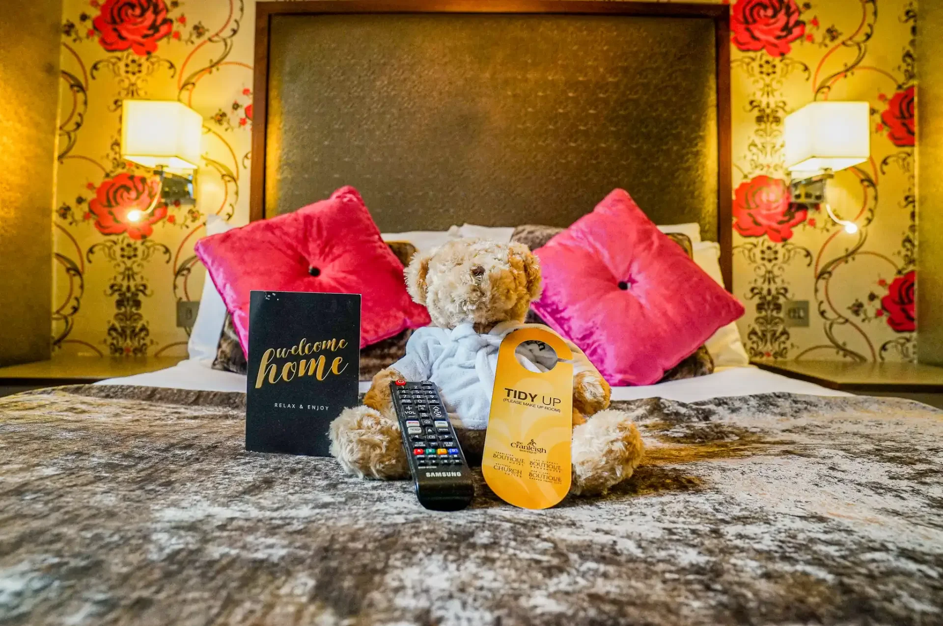hotel-bed-teddy-bear-tidy-up-sign.webp
