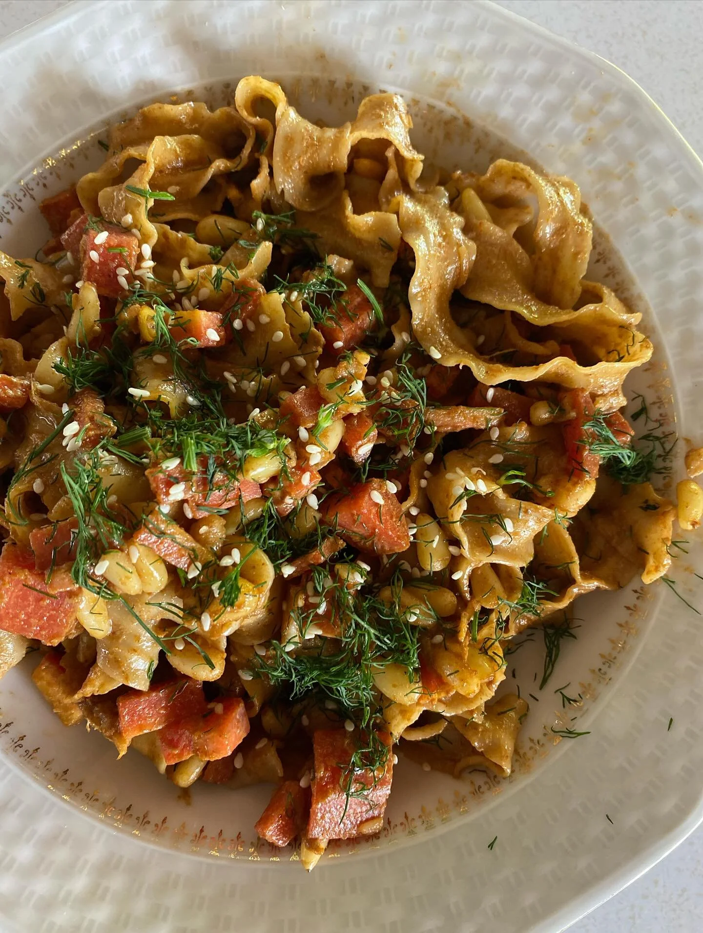 Carrots, dill, pine nuts, sesame seeds + noodles in a sticky chilli sauce.