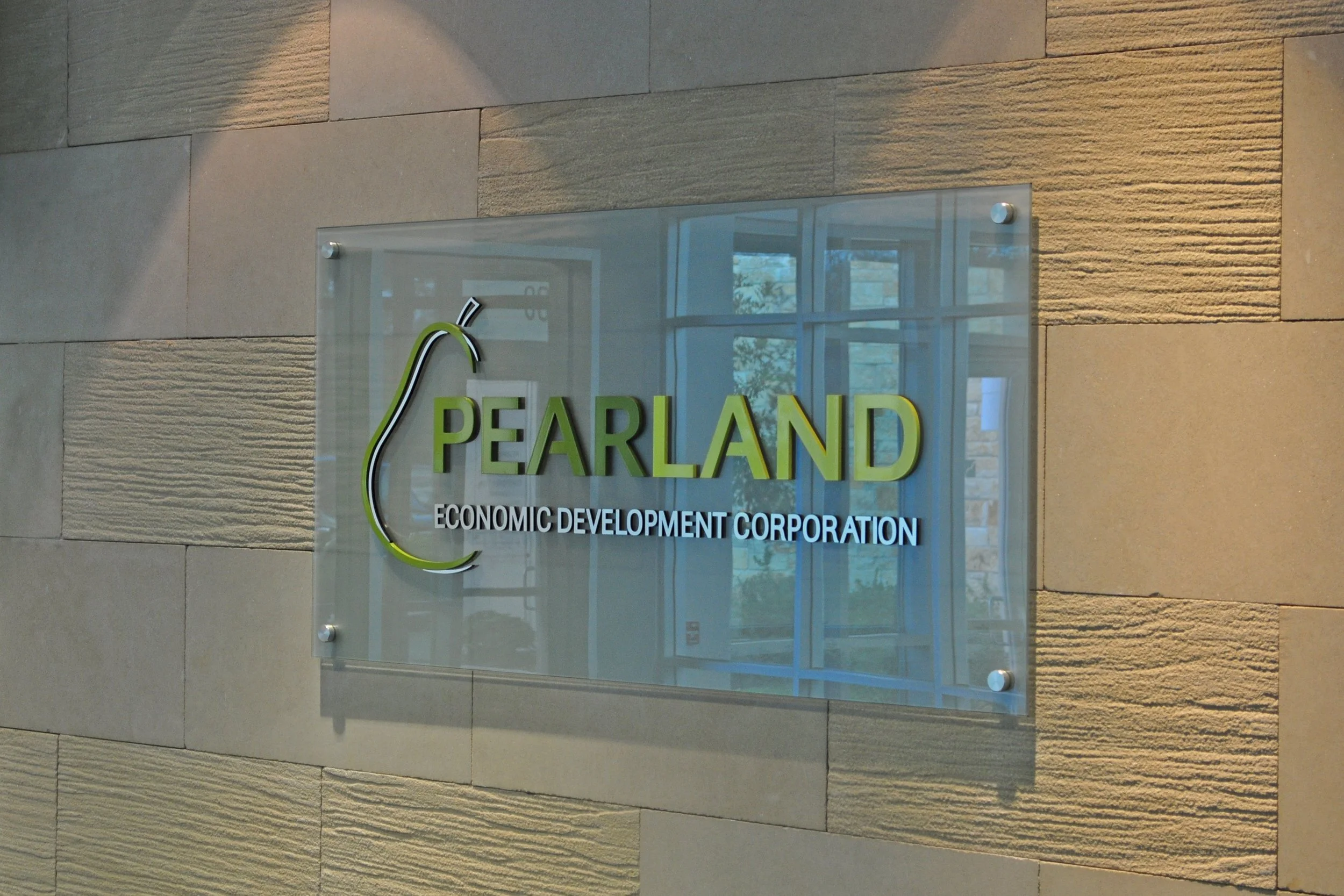 November-11--2010-Pearland--etched-glass-finish-with-acrylic-&-metal-finish-logo.jpeg