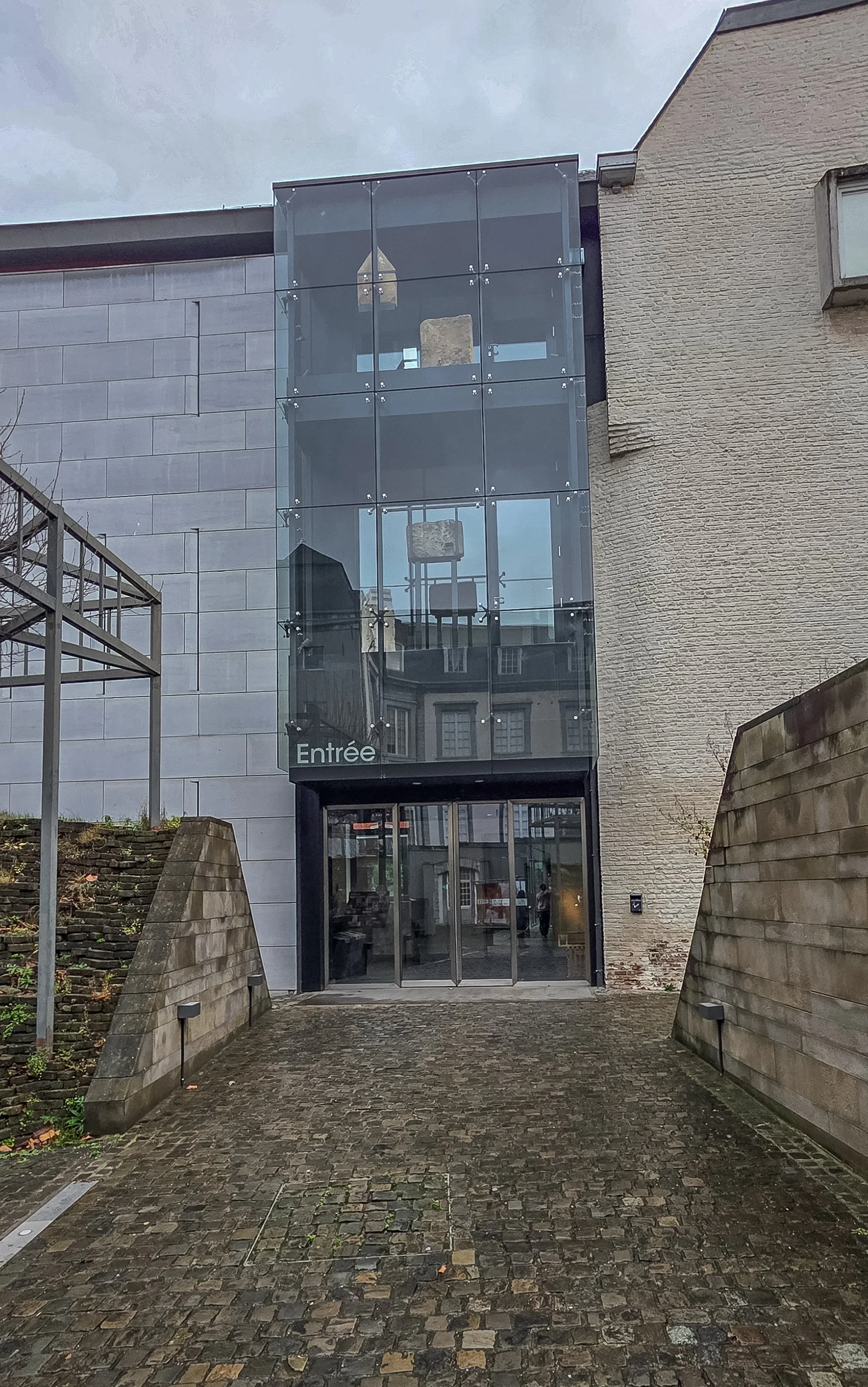 The modern and unassuming entrance to Le Grand Curtius arms museum in Liege, Belgium.