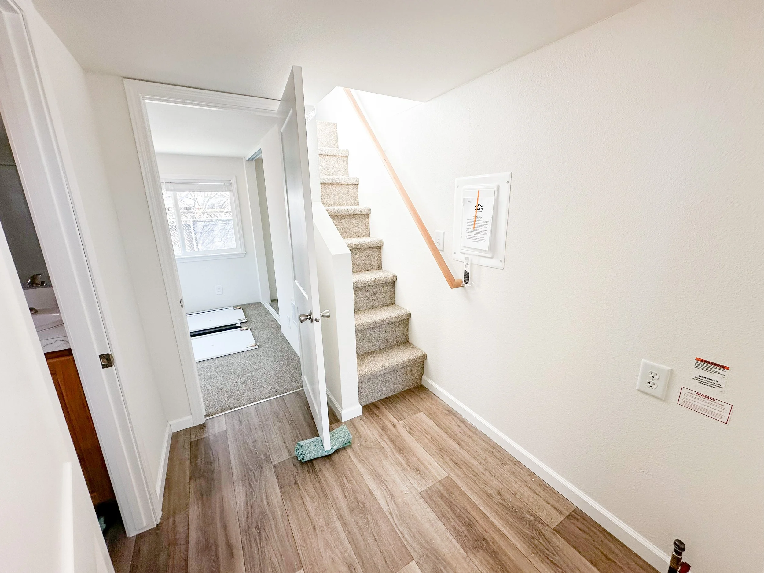 Hallway to loft, bedroom, and bathroom