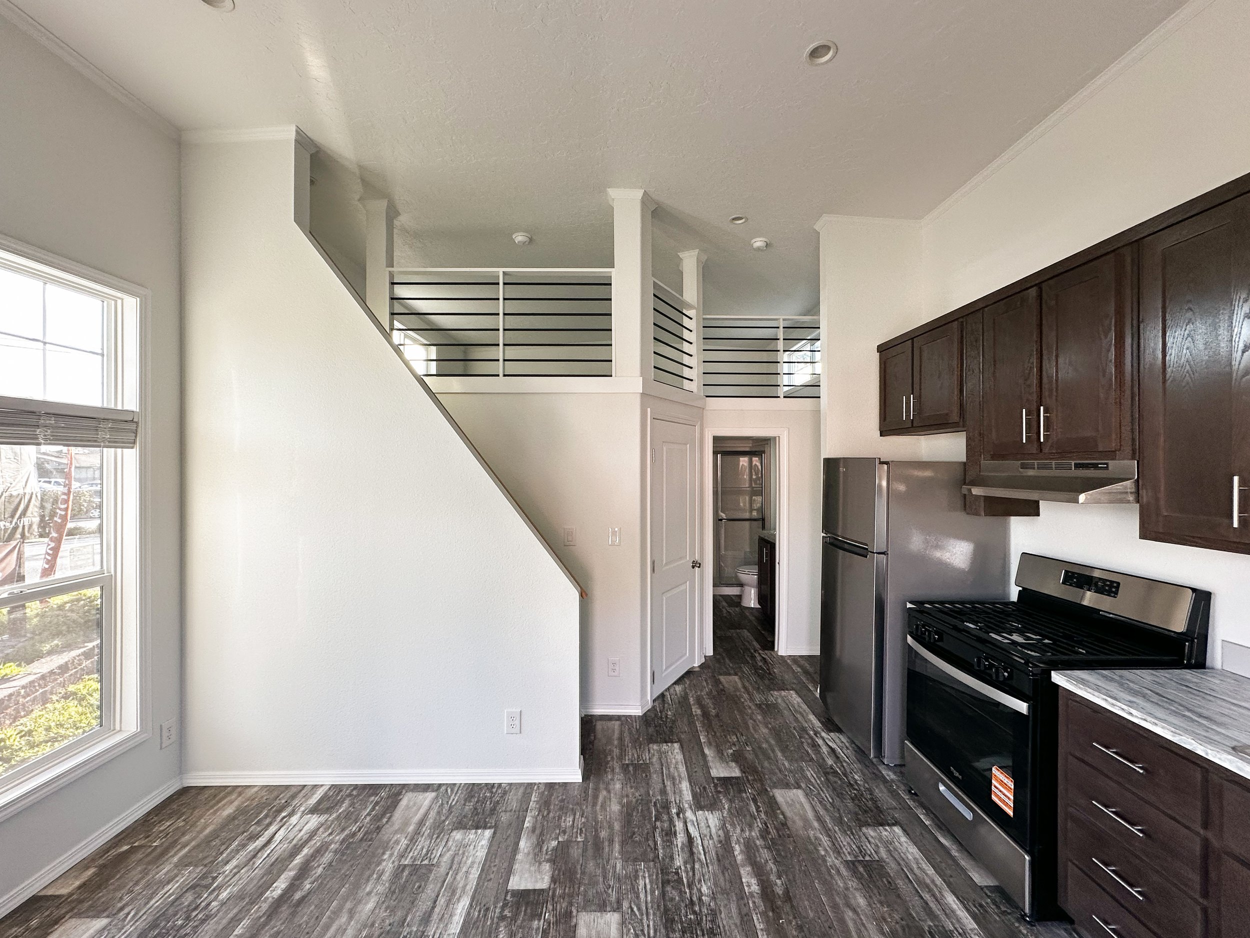 Lofted Ponderosa living area and kitchen