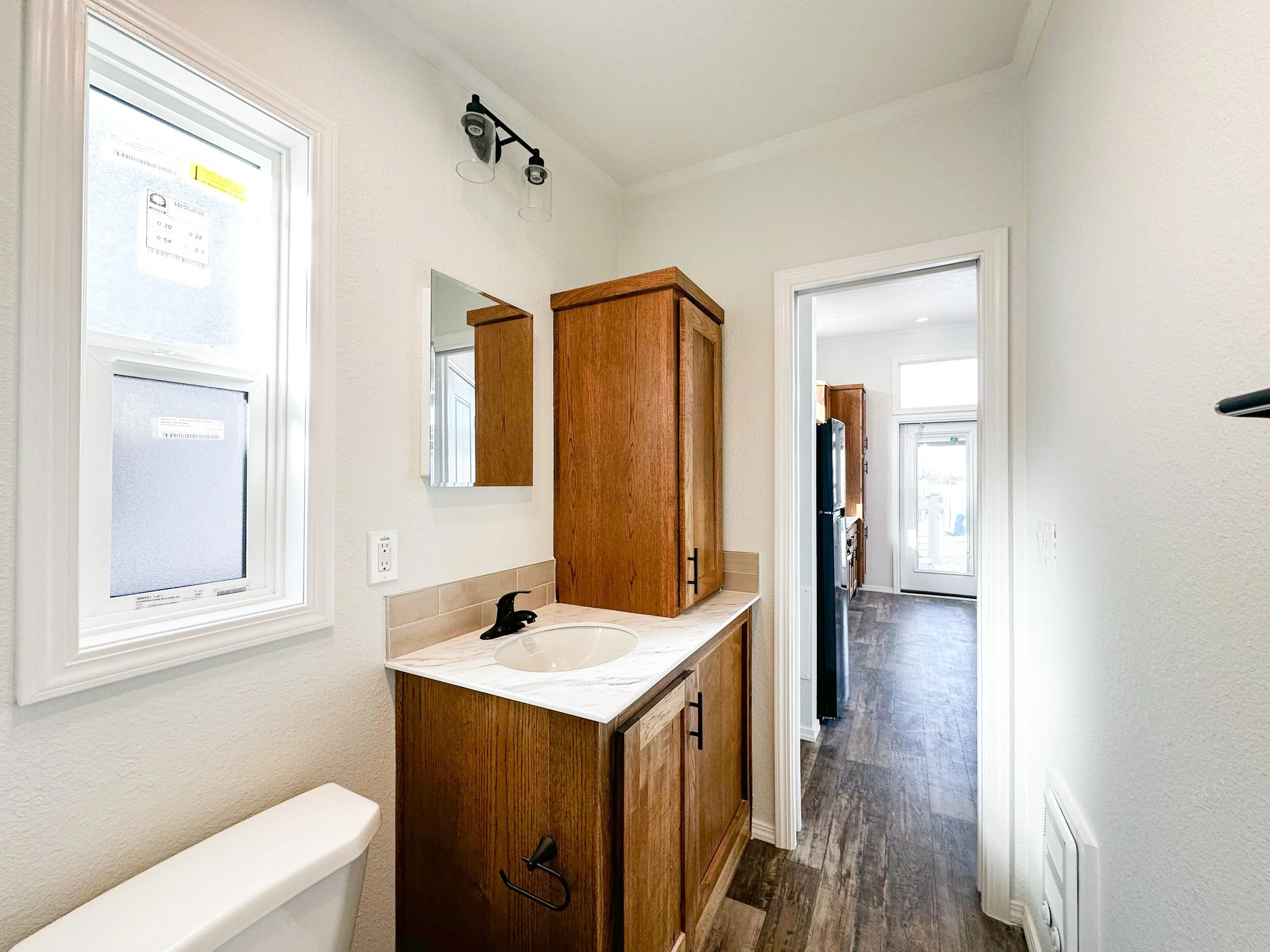 Ponderosa bathroom facing toward home interior
