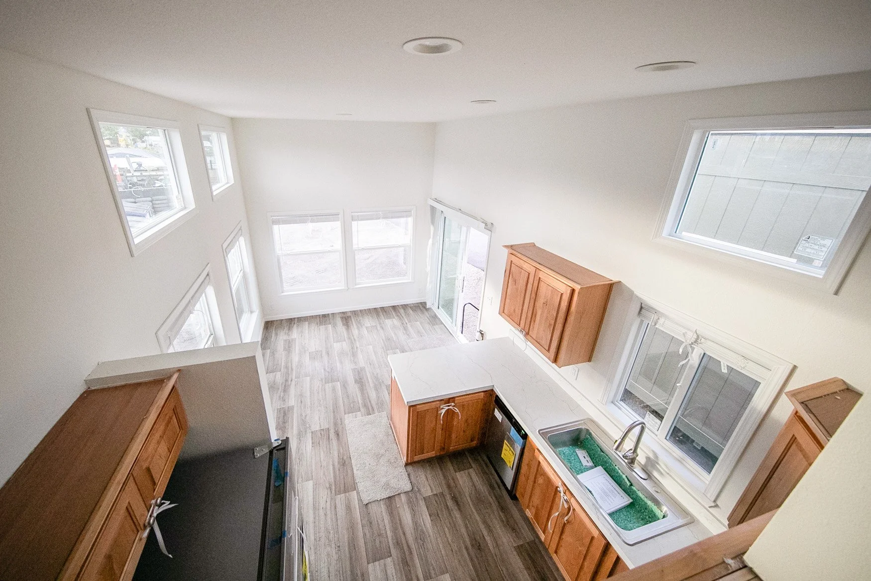 Overhead view from loft looking down on kitchen and living room