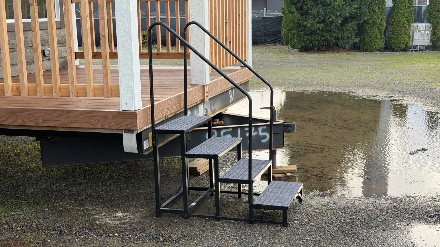 Pre-made stairs in front of tiny home