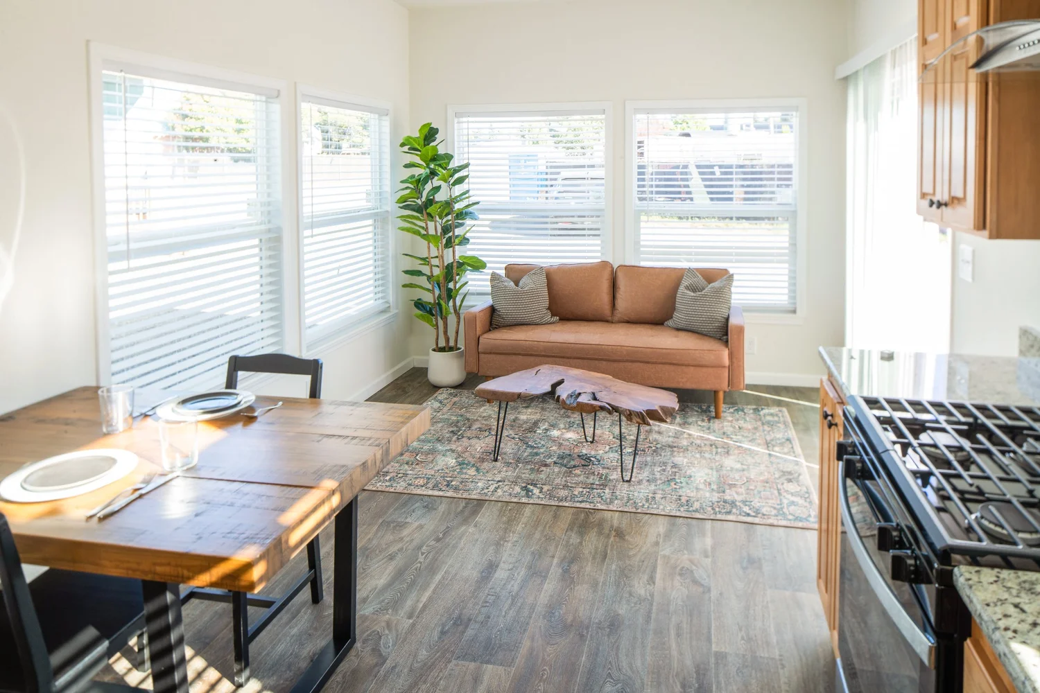 Willow lot model living room with high flat ceiling and natural light