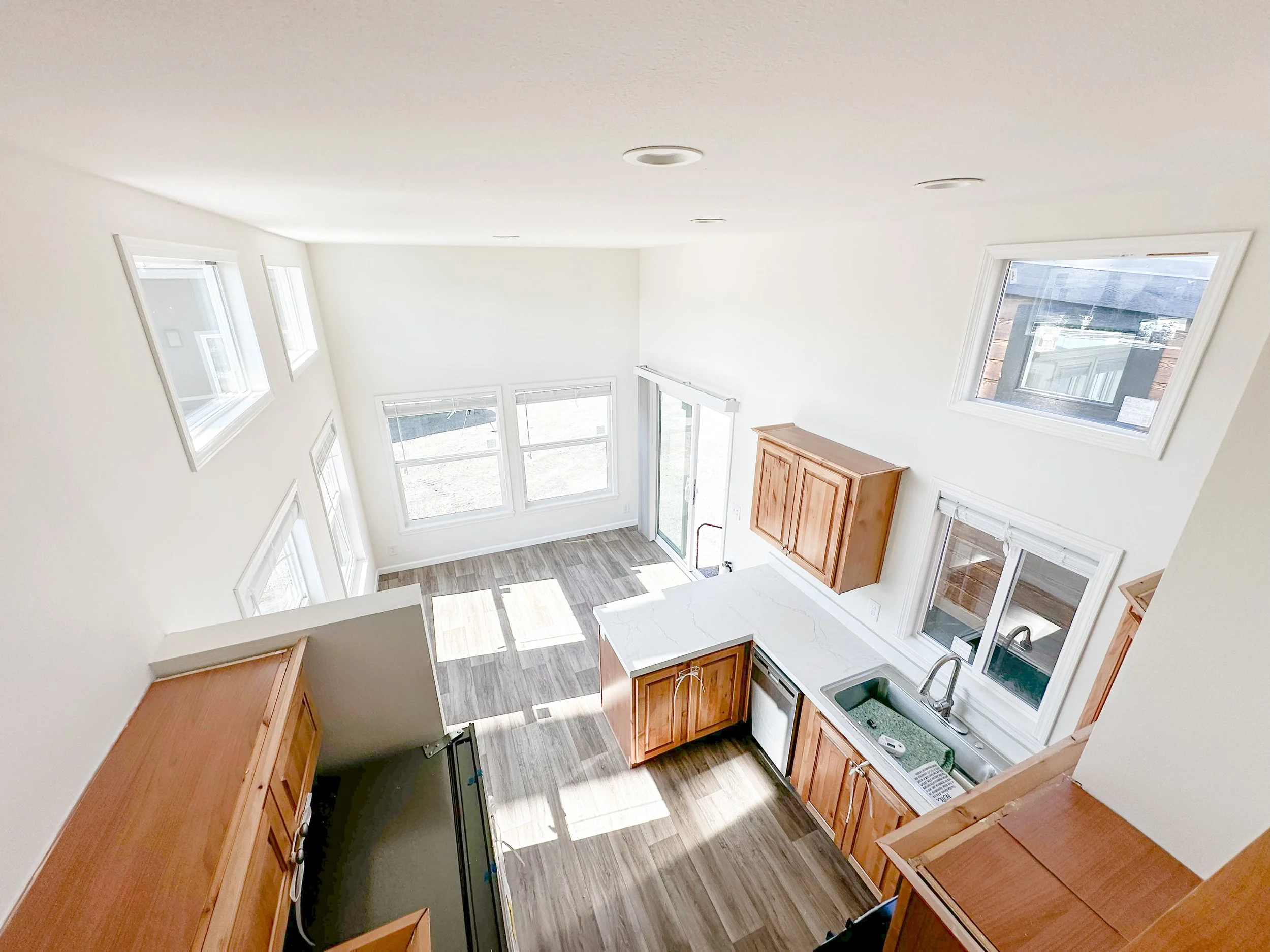 Overhead view from loft looking down on kitchen and living room