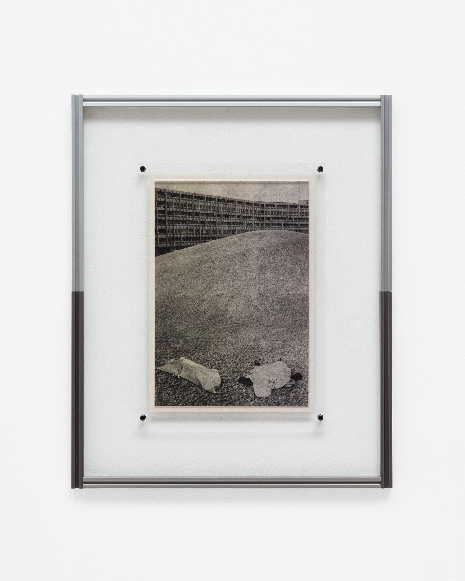   Homicide,   2025 Anodized aluminum, newsprint paper, plexiglass, stainless steel 10.6 x 13 x 0.4 in (27 x 33 x 1 cm)  Photo by LF Documentation