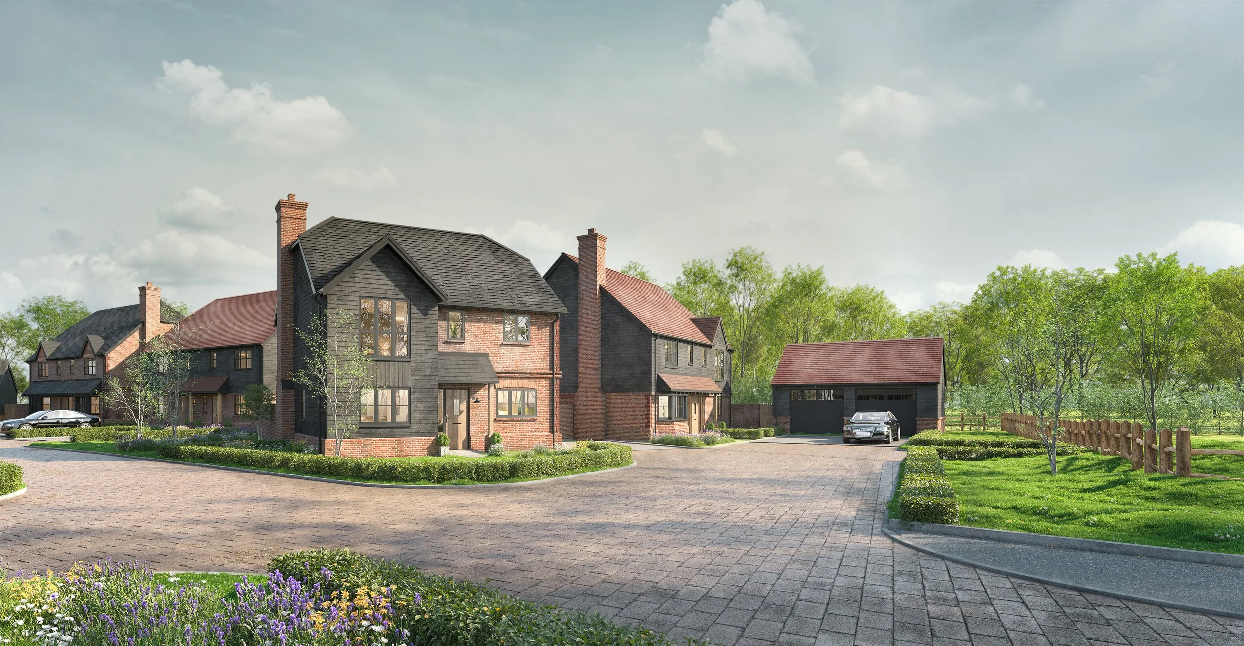 CGI image of the proposed nine-house residential development in South Nutfield, Surrey, showing homes, access road and landscaping.