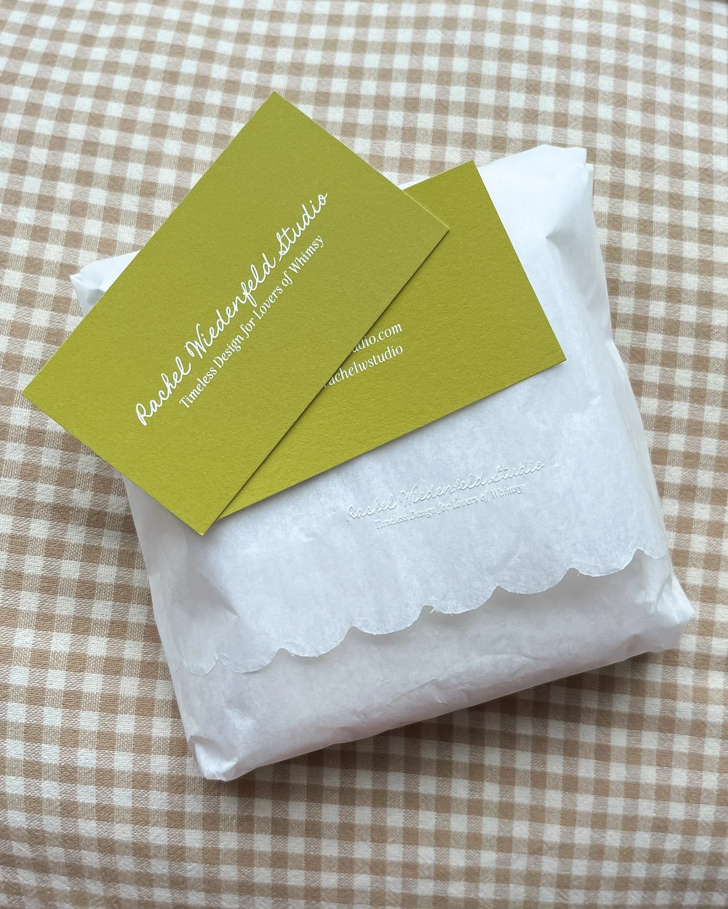 I spy a new addition to our parcel packing process! 🤍

So in love with our logo looks embossed on this cutie scalloped tissue!

@thegardinerstudio you&rsquo;ve got a goodie bound for you soon! 🤍 

#rachelwiedenfeldstudio #stationery #stationerydesi