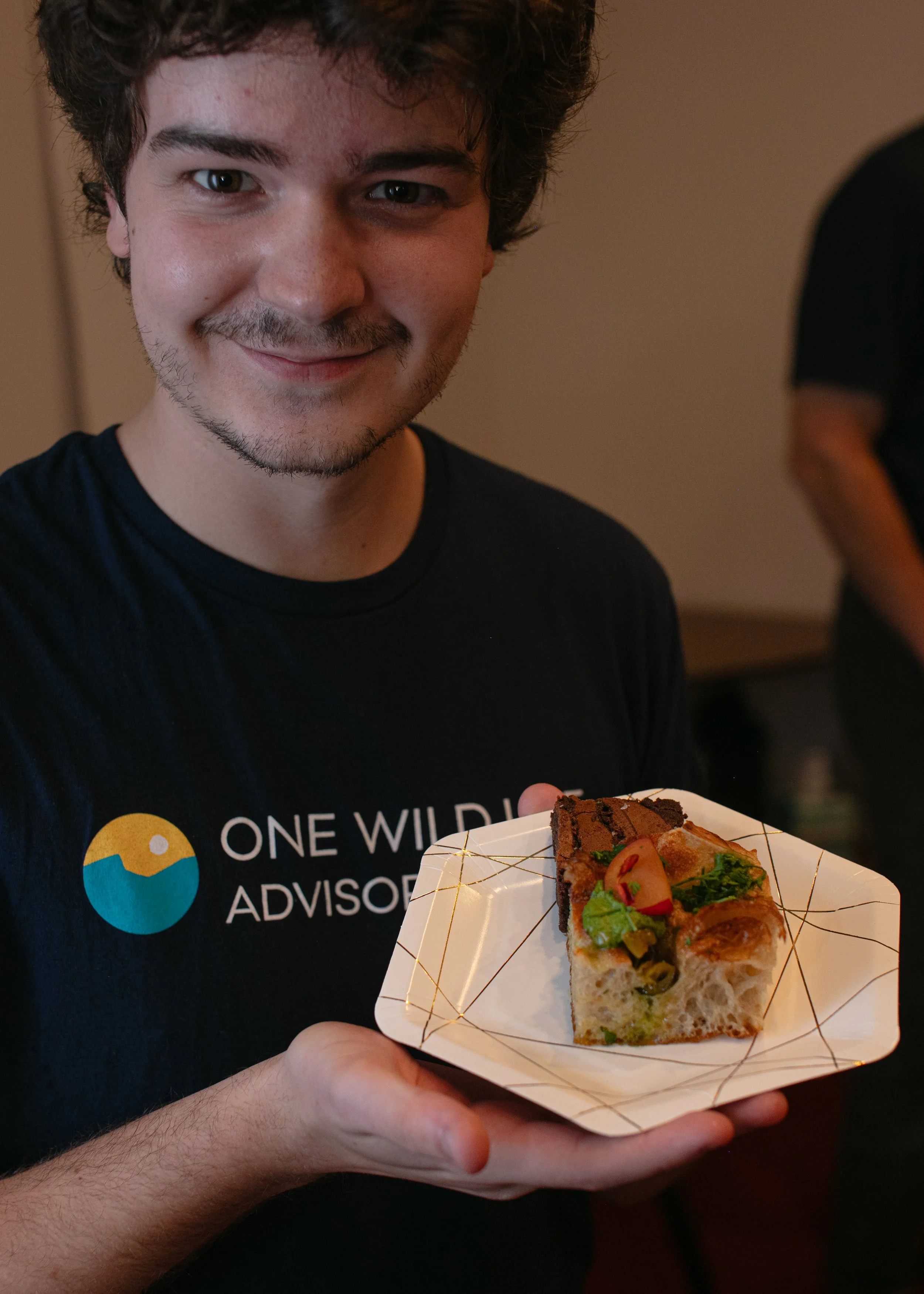 Colin with pastry.jpg