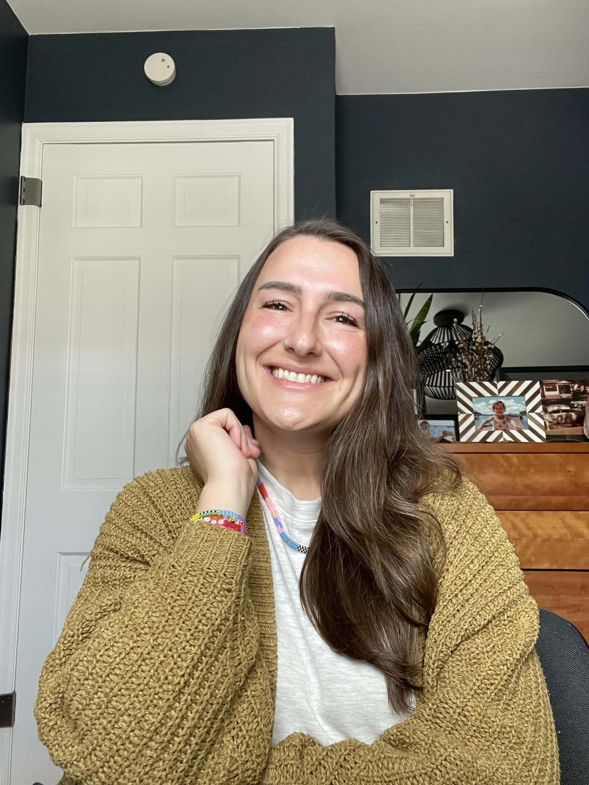 Clear Mind Counseling therapist in Minnesota with straight blonde hair, wearing a black top and smiling warmly, providing supportive and client-focused mental health counseling.