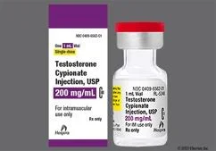Vial of testosterone cypionate with a purple and white label, indicating 200 mg/ml, USP, for intramuscular use.