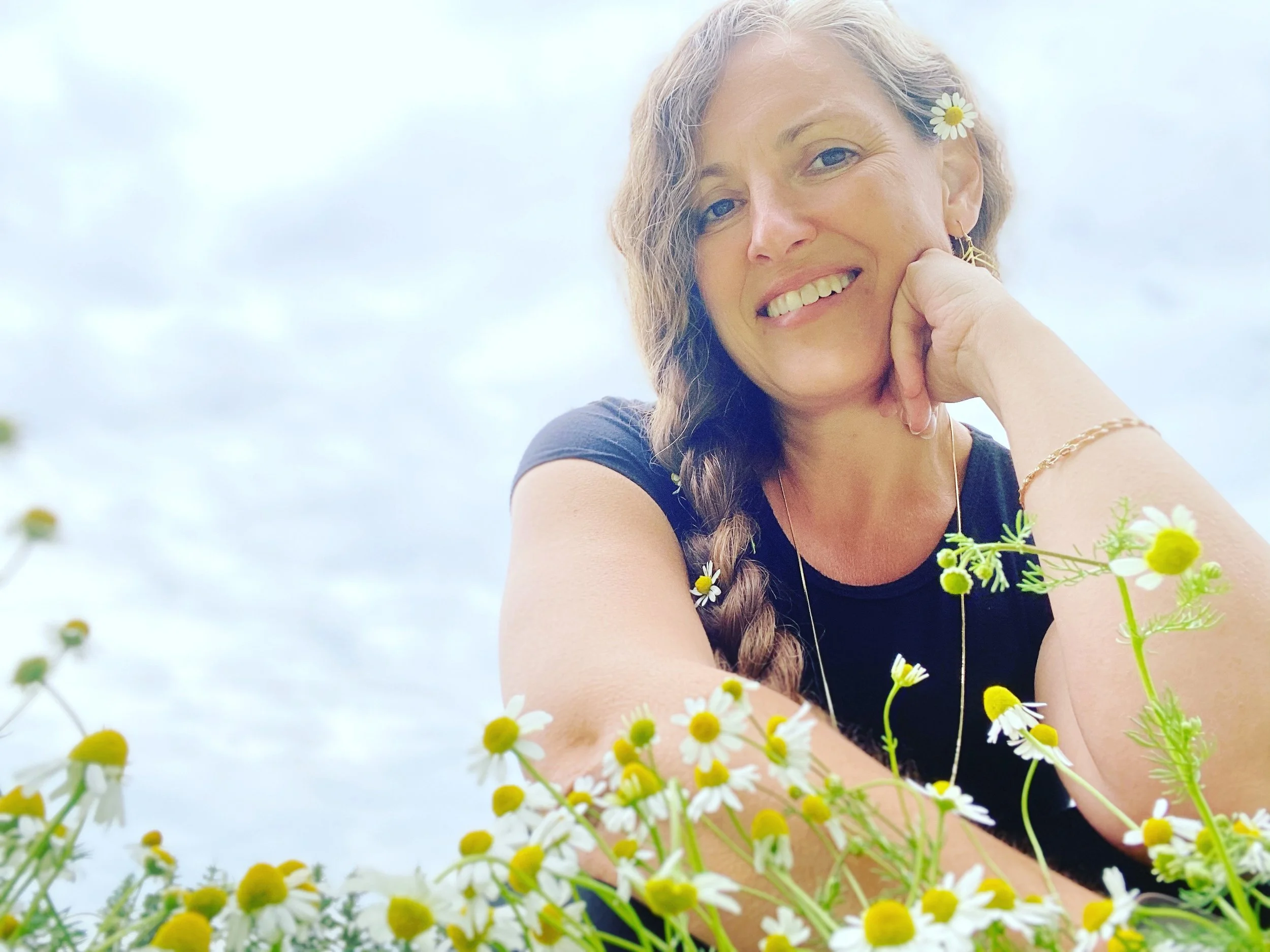 Chamomile field photo with founder creator