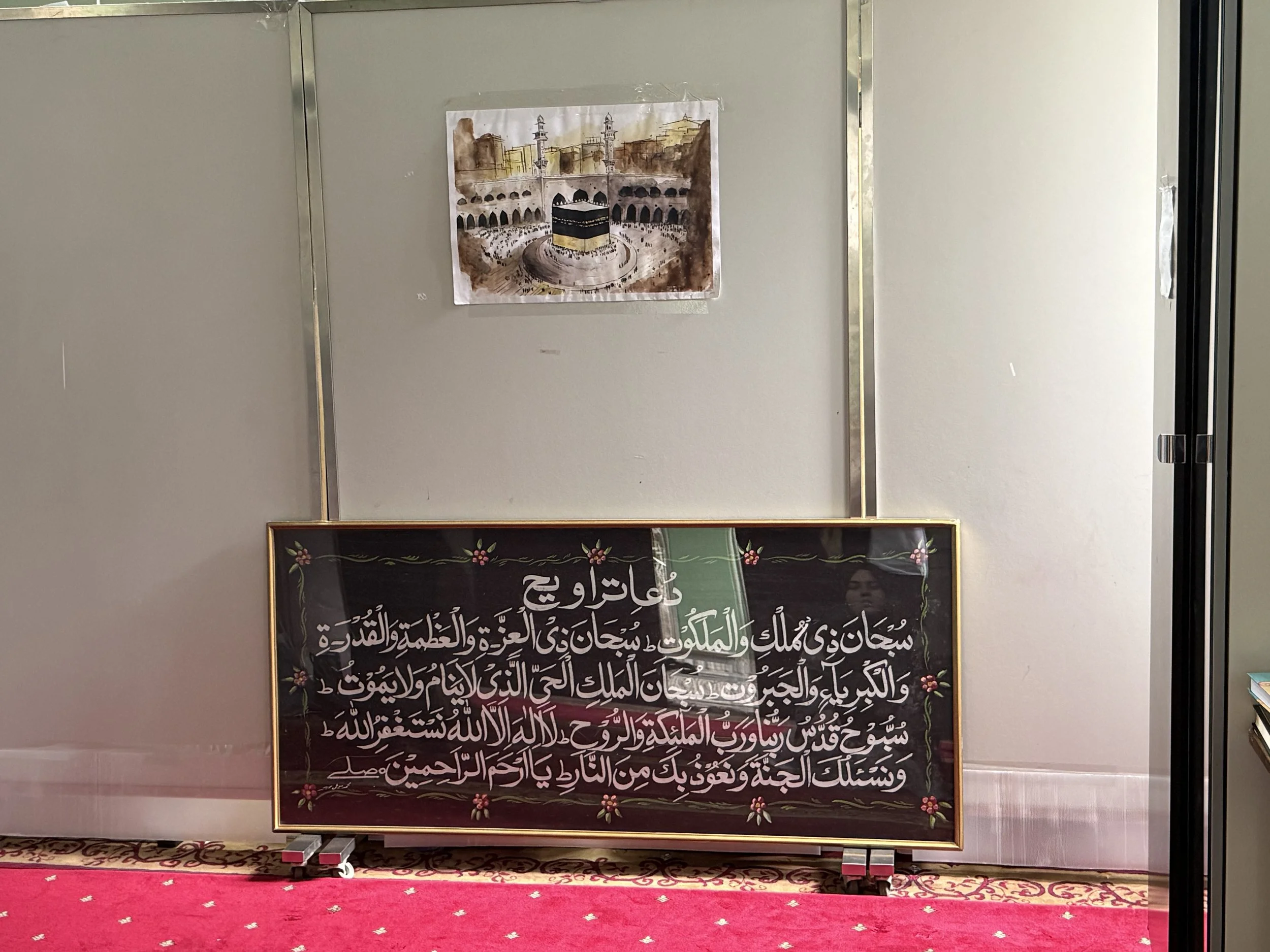 Inside the ladies' prayer space, improvised division