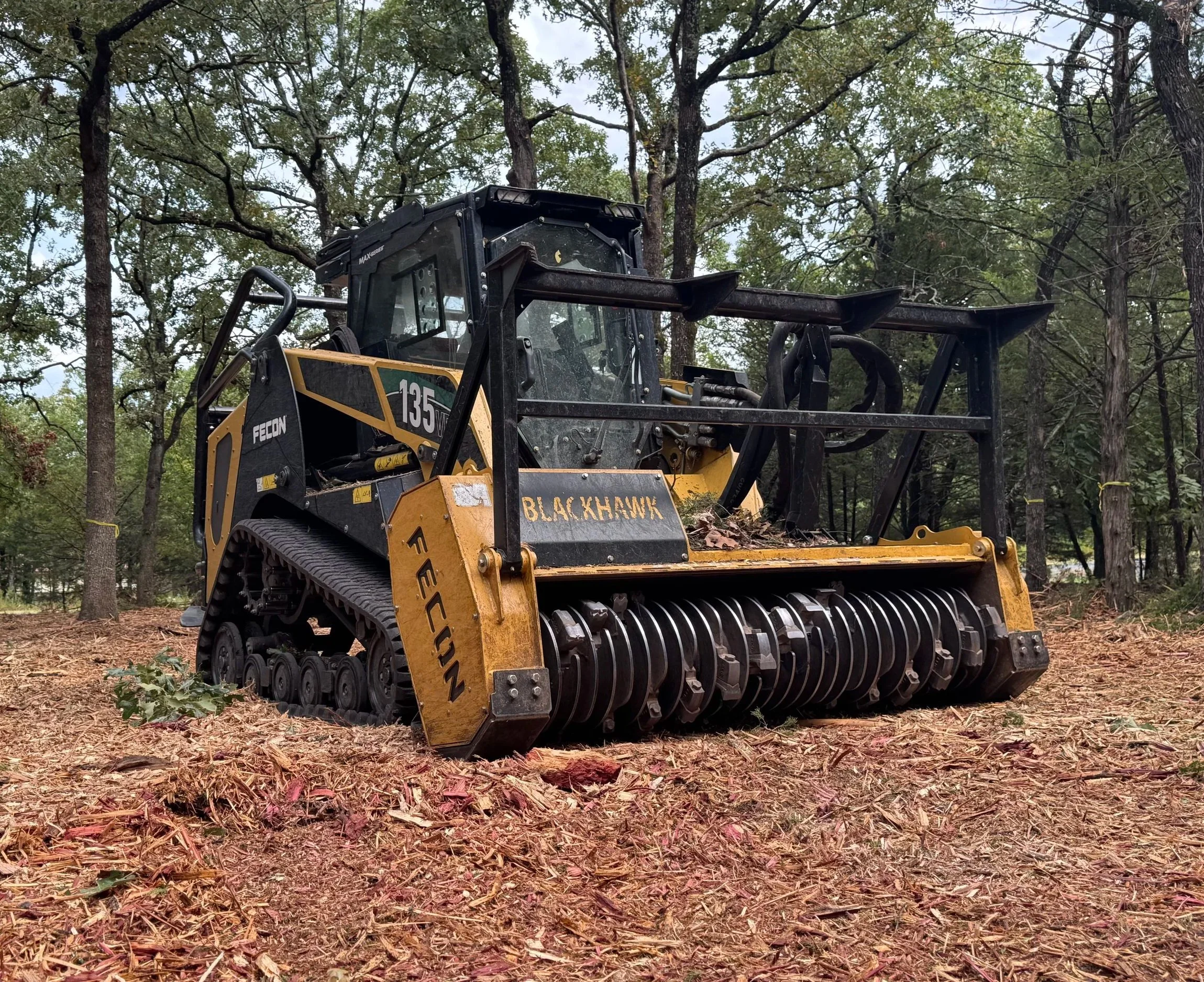 A forestry mulcher clears multiple acres a day, removing trees and underbrush while leaving a layer of biodegradable mulch. No ugly piles of trees and dirt left anywhere.