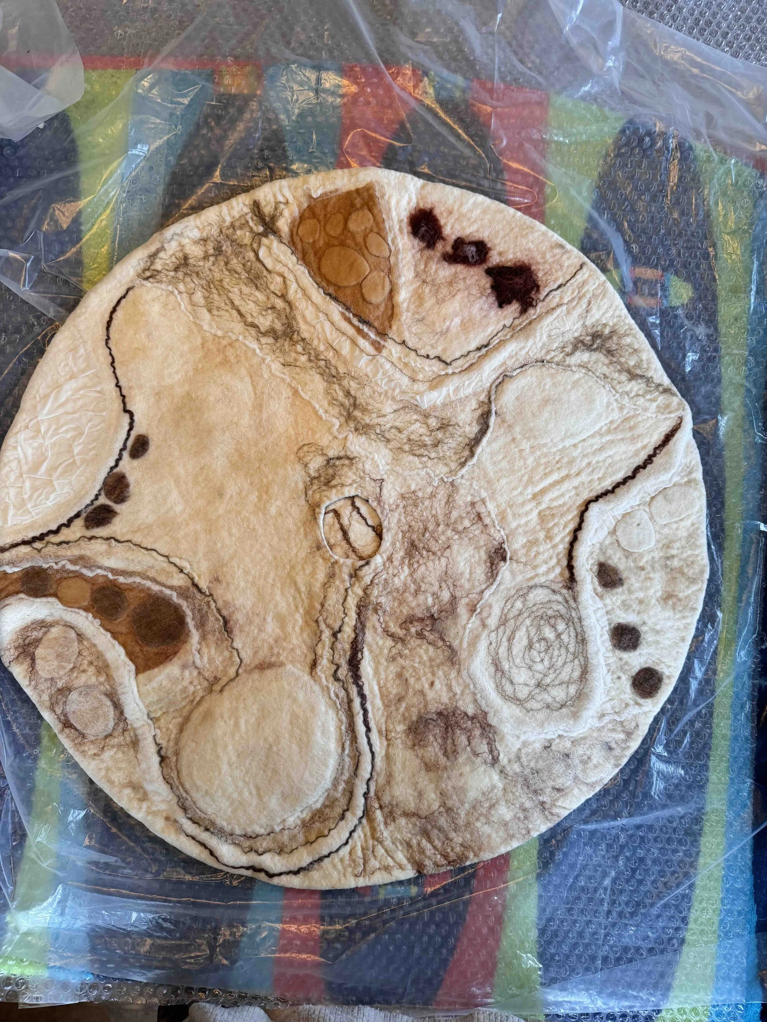 Felting it up. Craters are still covered.