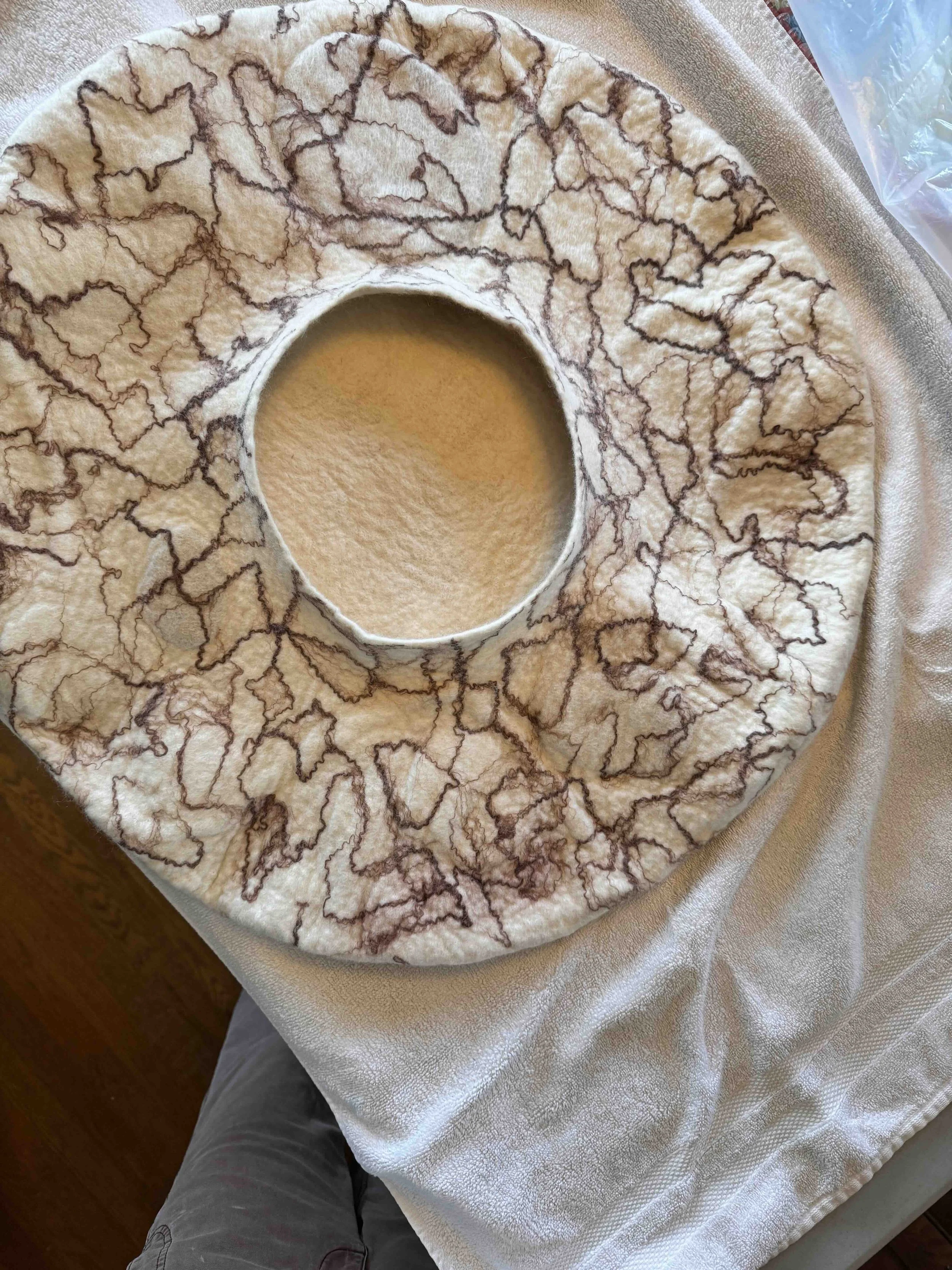 Turning it inside out and felting the inside.
