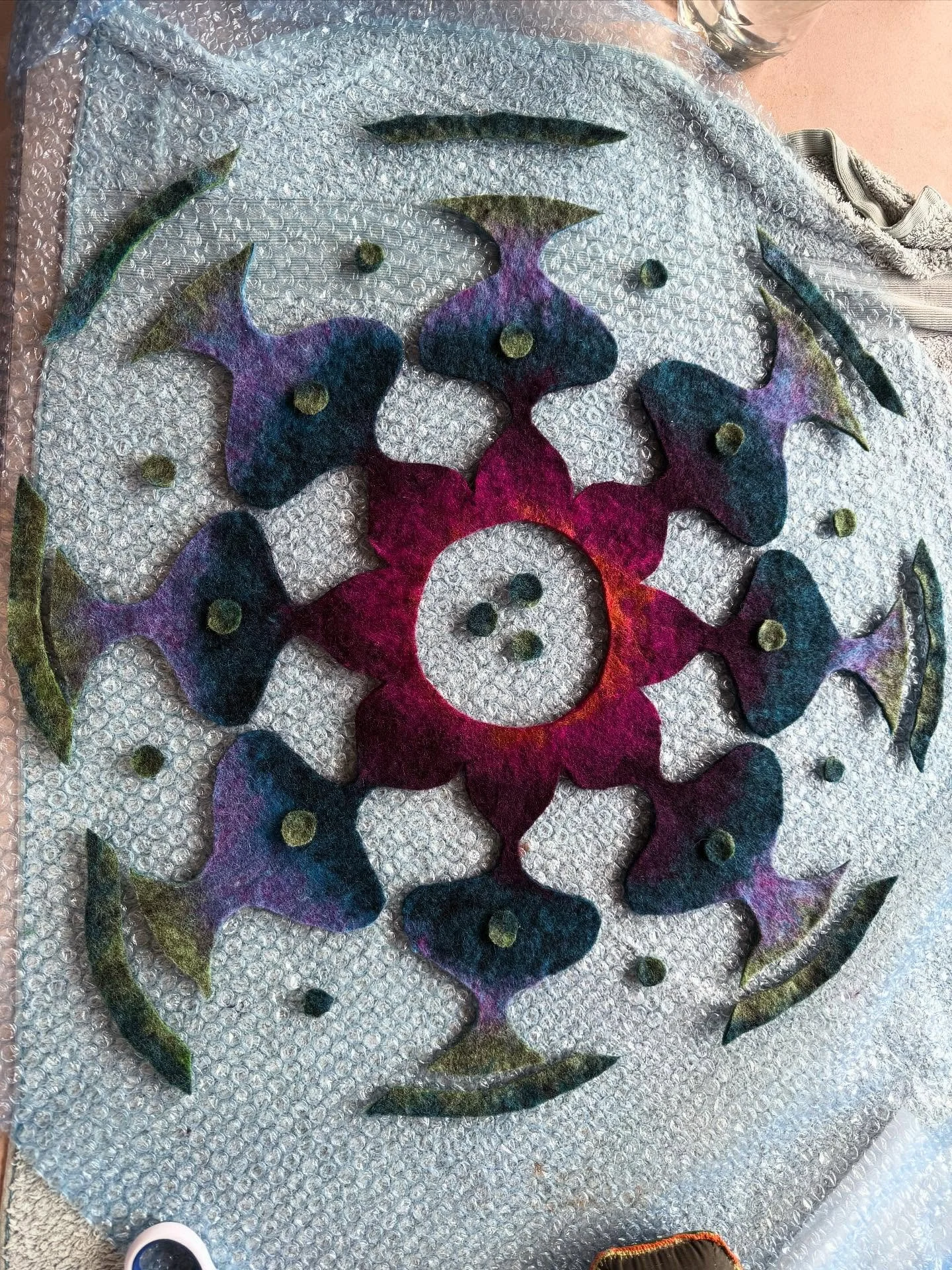 Mandalas&rsquo;s half complete. Excited to see the final product 🤩

The step is to felt this to a background colour and then sew them to a backing with zipper for a pillow case