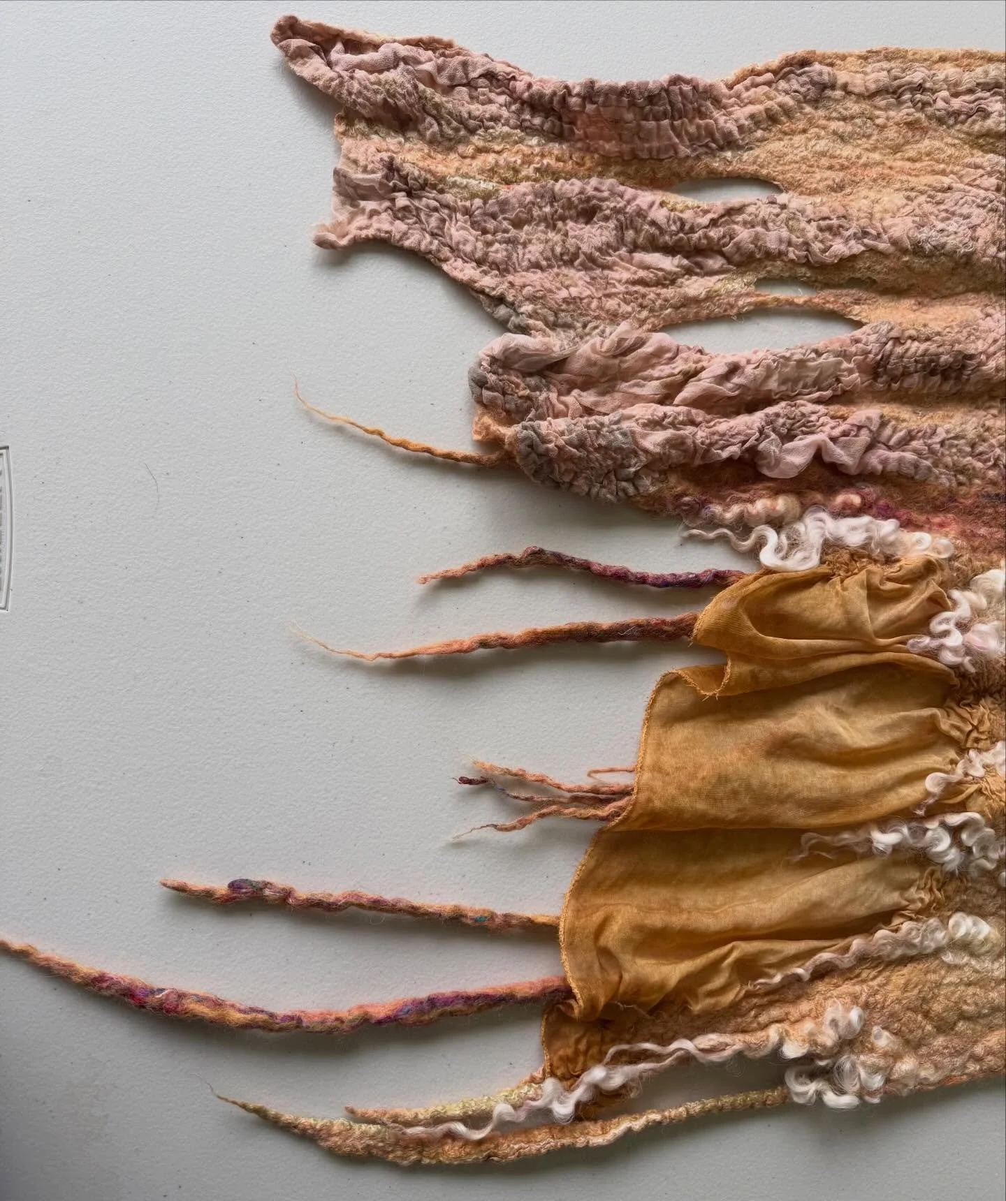 Nuno felting, a special technique that blends many natural fabrics and fibres together, to create wearable art.