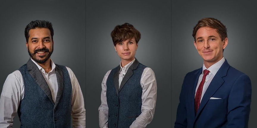 Three people in formal attire posing for portraits against a dark background.