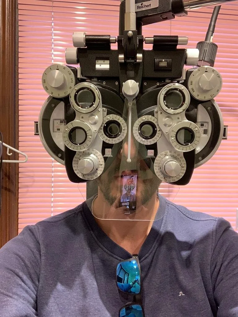 Phoropter with Dr.Tim-designed post-coved breath shield