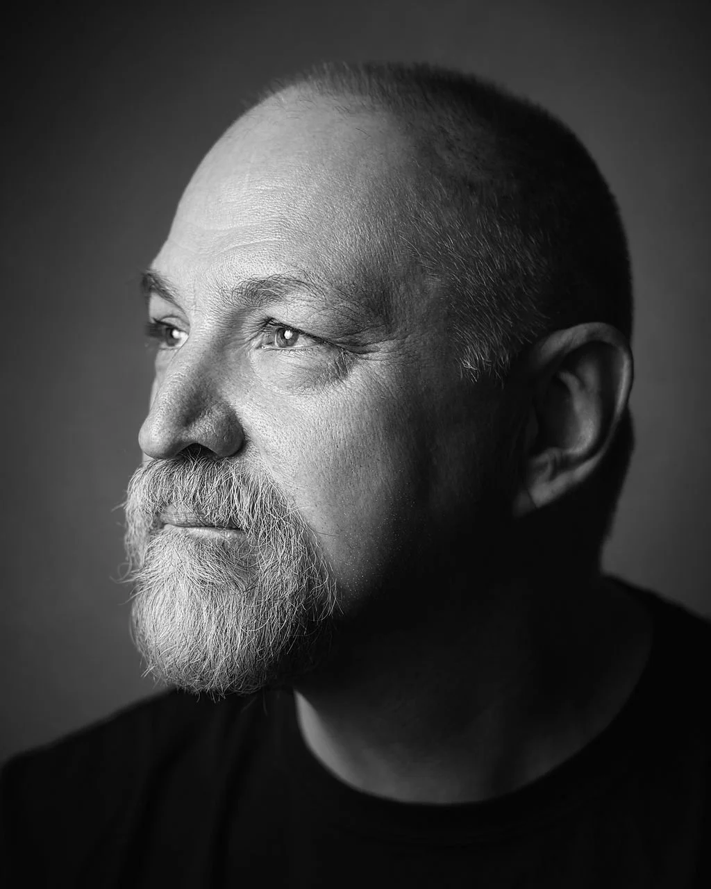 Black and white editorial portrait of horror author Edo van Belkom.