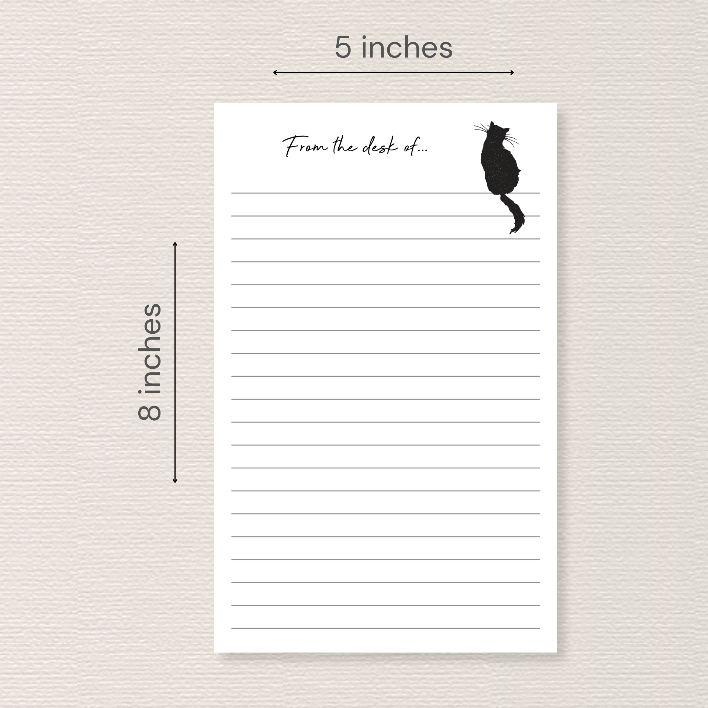 Notepad with black cat sitting on top line. Arrows and text next to image indicate the pad measures 5x8 inches.