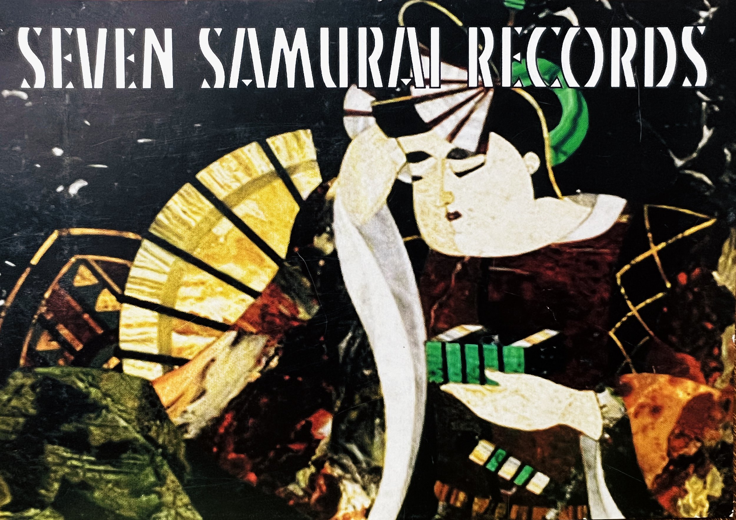 An illustration of a Japanese woman wearing traditional attire and holding a yellow fan, with the text 'Seven Samurai Records' above her.