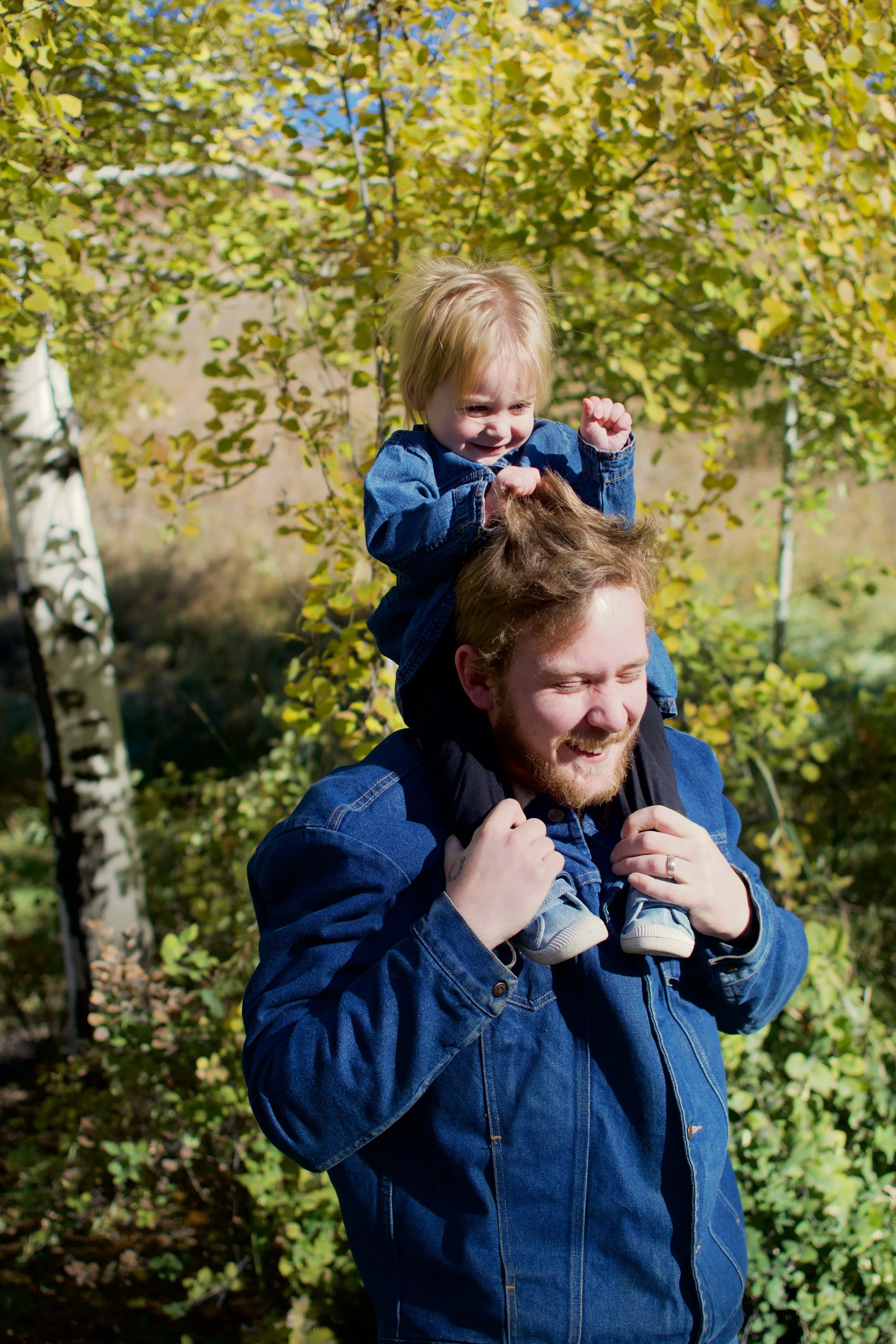 Taylor and Josie on shoulders.jpeg