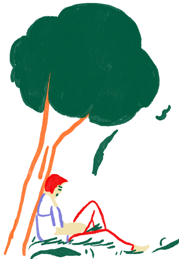 A person with red hair sitting on a bench under a tree, reading a book.