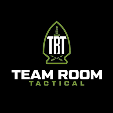 Logo for TEAM ROOM TACTICAL with a green and white design including a stylized shield shape.
