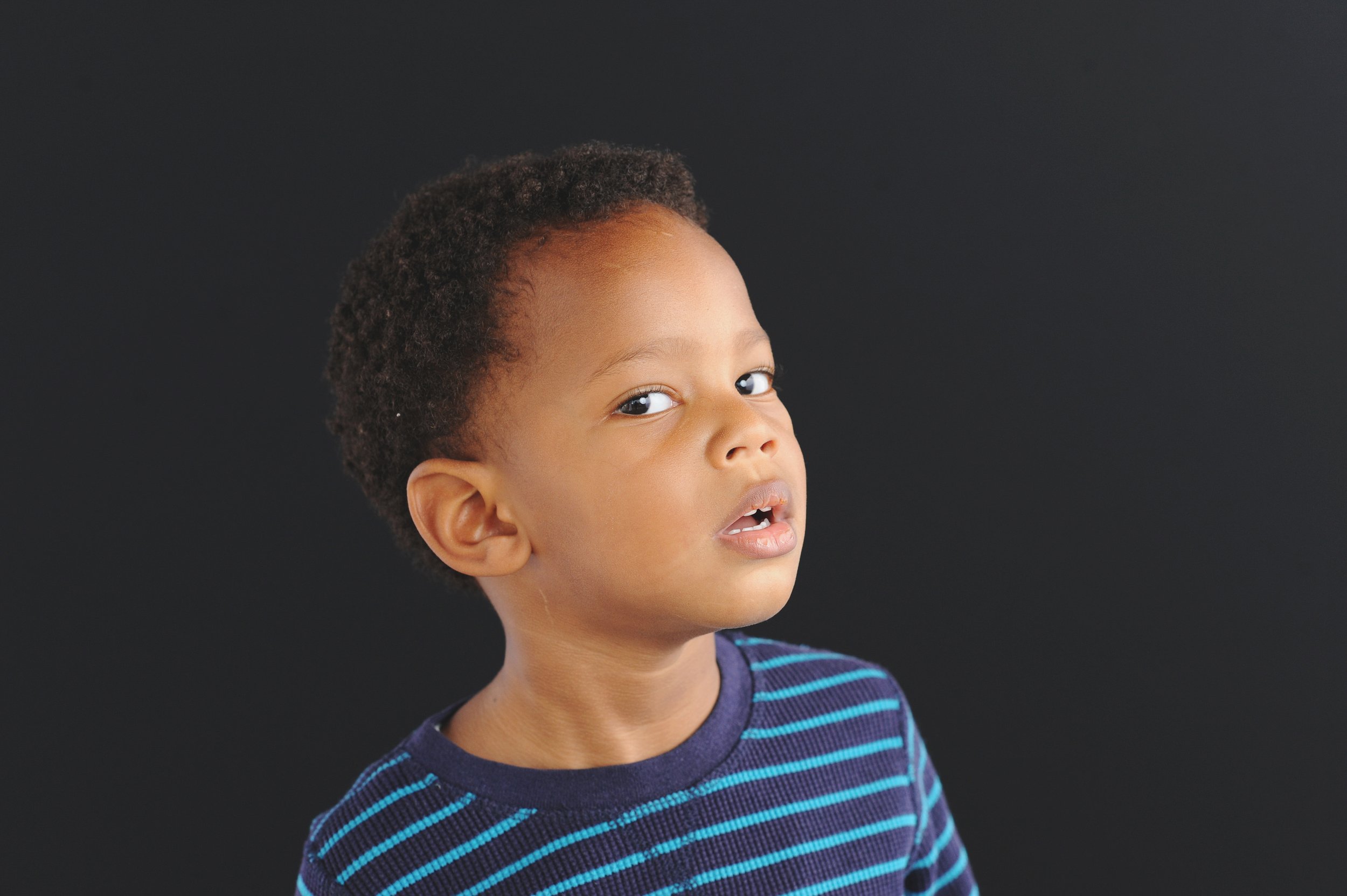 Pelham, NY Pop-Up Kids Portrait Curious Adorable Boy Studio Backdrop Black