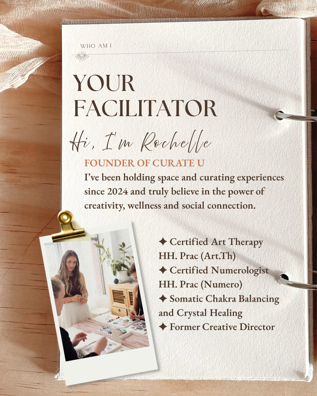 Open notebook page with a printed introduction for Rochelle, founder of Curate U, mentioning her credentials and experience. There is a small Polaroid photo of Rochelle leading a tarot card reading session, clipped to the page with a gold paperclip.