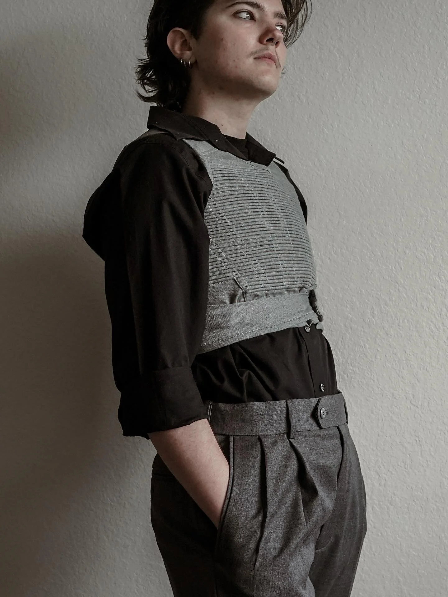 The Corded Binder

A first iteration of a corded compression top based on some of the concepts from regency short stays and corded stays. 
(There&rsquo;s a clever joke somewhere in this project about being a self-made man)

I have never made anything